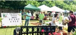  ??  ?? Master Gardeners attend the 2019 annual plant sale held last spring to encourage home gardeners to get their hands dirty. (Courtesy photo)