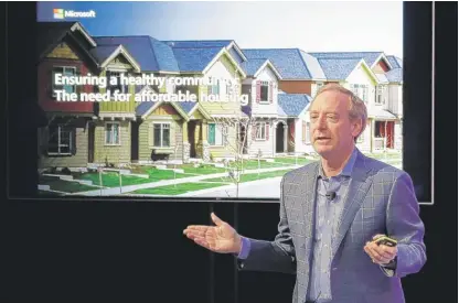  ?? TED S. WARREN/AP ?? Microsoft President Brad Smith on Thursday outlines the company’s $500 million donation for affordable housing.