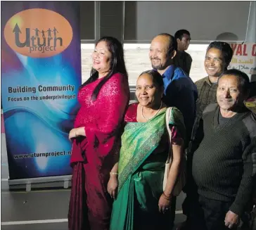  ?? Christina Ryan, Calgary Herald ?? Gayatri Diyali, Dhamber Diyali, Manmaya Biswa, Jumensinz Biswa and Aaiman Ghimire are all from Bhutan and are close friends in Calgary. Together they came to find resources at the Genesis Centre on Saturday.