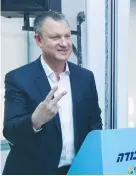  ??  ?? MK EREL MARGALIT votes in the capital on Tuesday, in the first round of the Labor Party’s leadership primary. He came in fourth place.