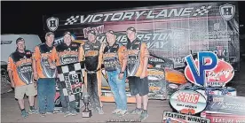  ?? ALEX AND HELEN BRUCE PHOTOGRAPH­Y ?? Brad Rouse with his crew after his victory in the Race of Champions Dirt 602 Series event at Humberston­e Speedway Sunday.