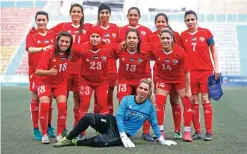  ??  ?? Palestinia­n female football players (in red) are seen during a qualifying match against Thailand for the Asian Women football Cup in the West Bank town of Al-Ram.
