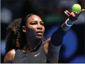  ?? Andy Brownbill / The Associated Press ?? Serena Williams gets ready to serve to Belinda Bencic during their first-round match at the Australian Open.