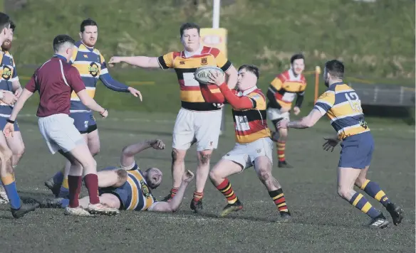  ??  ?? Sunderland RFC (red/black/yellow) in action against Ashington last year before lockdown.