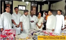  ??  ?? Diyawadana Nilame Pradeep Nilanga Dela at a meeting with officials