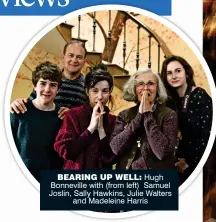  ??  ?? bearing up well: Hugh Bonneville with (from left) Samuel Joslin, Sally Hawkins, Julie Walters and Madeleine Harris