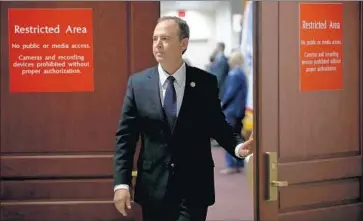  ?? Win McNamee Getty Images ?? REP. ADAM SCHIFF (D-Burbank) leaves a House Intelligen­ce Committee meeting at which members OKd the release of the Democrats’ rebuttal of a GOP memo, which alleges anti-Trump bias in the government.