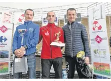  ??  ?? Podium masculin avec de gauche à droite : David Hardy, Francis Garnier et Jérôme Ricou.