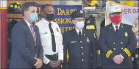  ??  ?? Delaware County Emergency Services Director Tim Boyce, Upper Darby Fire Chief Derrick Sawyer, Cardington Stonehurst Fire Co. President Ray Weed and Cardington Stonehurst Volunteer District Chief Timothy Powers pose for a photo.