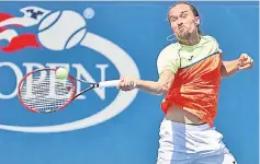  ??  ?? Dolgopolov returns a shot to Jan-Lennard Struff during their first round men’s singles match on Day Three of the US Open at the USTA Billie Jean King National Tennis Centre in the Flushing neighbourh­ood of the Queens borough of New York City. — AFP photo