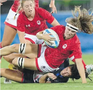  ?? SEAN KILPATRICK/THE CANADIAN PRESS FILES ?? Canada’s Karen Paquin, seen playing against Britain in rugby sevens at the 2016 Olympic Games in Rio de Janeiro, says she left a “very organized and very supported” sevens group to try to win a Women’s Rugby World Cup with the national 15s team. The...