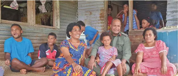  ?? Photo: RFMF Media Cell ?? Republic of Fiji Military Forces Commander Land Force, Colonel Manoa Gadai with the widow of the late Baleyagani­ga Village headman Amoritikei Mainalulu (right) and Mr Mainalulu’s family.