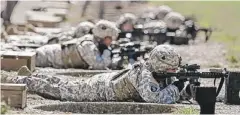  ?? | MARK HUMPHREY/AP ?? Female soldiers train on a range in 2012 in Fort Campbell, Ky.
