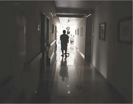  ?? (Illustrati­ve, Reuters) ?? A CANCER patient walks in the hallway of a hospital.