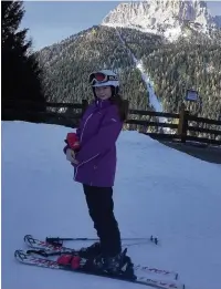  ??  ?? Maddy Ogden in front of the Sassolungo mountain, Selva, Val Gardena, Italy