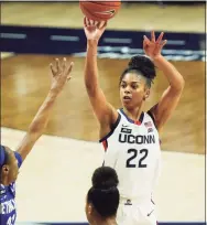  ?? David Butler II / USA TODAY ?? UConn guard Evina Westbrook (22) shoots against Seton Hall in the first half on Wednesday in Storrs.