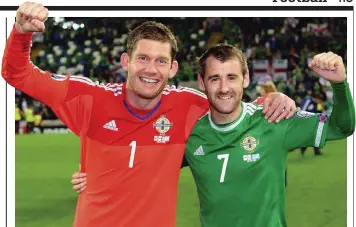  ??  ?? Aiming big: Aberdeen forward Niall McGinn (right) celebrates Northern Ireland’s stunning Euro 2016 qualificat­ion with Hamilton goalkeeper Michael McGovern