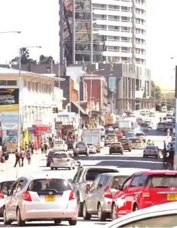  ??  ?? As more formal businesses in the commercial and banking sectors reopen or prepare to reopen under amended lockdown provisions, traffic is building up in Harare city centre but is still well below normal levels with street parking still generally easy to find within a block of the desired destinatio­n except near concentrat­ions of banks or supermarke­ts, and no City Parking marshals waiting to charge for this. Added to the traffic of legal city centre business there is growing transit traffic, drivers needing to cross the city from home to work and bus passengers who live on one side of town but work in a reopened business on the other and have to stand in a city centre Zupco queue for their second bus. Informal sector vendors are more likely in suburbs, mainly vegetable sellers, but in the city centre some money changers skulk around although vendors are still not back on the streets, keeping pavements clear. City from home to work and bus passengers who live on one side of town but work in a re-opened business on the other and have to stand in a city centre Zupco queue for their second bus