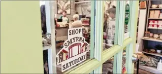  ?? MAYA T. PRABHU/MAYA.PRABHU@AJC.COM ?? Customers stopped by to shop at Gifting Tree and the Secret Garden gift shop in Smyrna for Shop Smyrna Day, a localized version of Small Business Saturday.