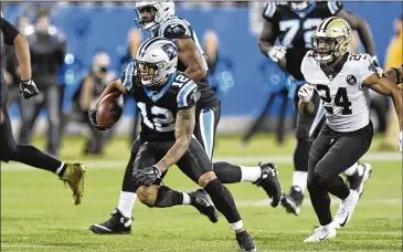  ?? DAVID T. FOSTER III / CHARLOTTE OBSERVER ?? Panthers rookie receiver D.J. Moore has shown his ability to break tackles and is all Carolina expected. He’s No. 4 in the NFL among wide receivers with an average of 8.1 yards after the catch.