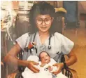  ?? SEMINATORE FAMILY PHOTO ?? Wong holds the infant Brandon at Stanford Children’s Hospital in 1990.