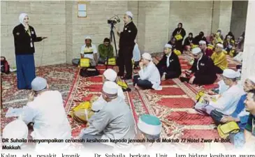  ??  ?? DR Suhaila menyampaik­an ceramah kesihatan kepada jemaah haji di Maktab 77 Hotel Zwar Al-Bait, Makkah.