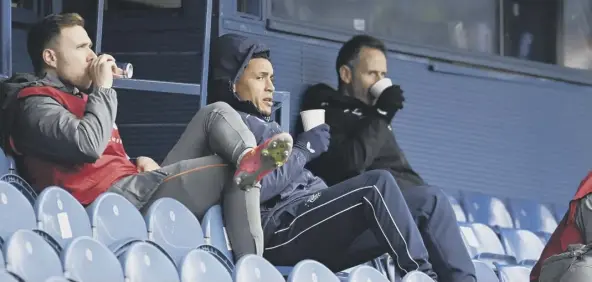  ??  ?? 0 James Tavernier watches on from the stands as Rangers beat Hibs 2-1 at Ibrox yesterday