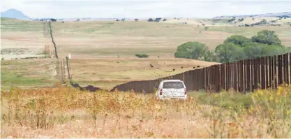  ?? NICK OZA/THE REPUBLIC ?? KWR Constructi­on of Sierra Vista became the second Arizona company chosen for the controvers­ial project intended to test border wall designs.