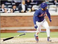  ?? Sarah Stier / Getty Images ?? The Mets’ Eduardo Escobar reacts after hitting a walk-off RBI single during the tenth inning against the Marlins at Citi Field on Wednesday in New York City. The Mets won 5-4.