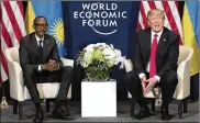  ?? TOM BRENNER / THE NEW YORK TIMES ?? President Donald Trump meets with Paul Kagame, president of Rwanda, at the World Economic Forum in Davos, Switzerlan­d, Friday.