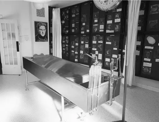  ?? John Morsta d for National Post ?? An autopsy bench in the Vancouver Police Museum, a formerly functionin­g autopsy facility. In 1959 an autopsy was performed on Errol Flynn on this table and his body was placed into the adjacent morgue before being sent to California.