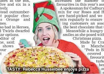  ??  ?? TASTY: Rebecca Husselbee enjoys pizza