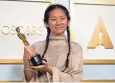  ?? AP ?? At the Oscars on Sunday, Chloe Zhao
won best director for “Nomadland,” which also took home best picture.