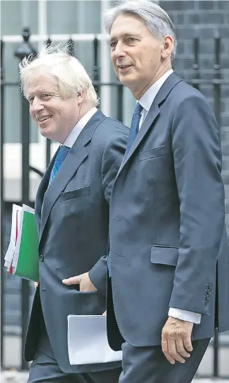  ?? Pictures: STEVE REIGATE ?? Boris Johnson and Philip Hammond in a show of unity after two hours of discussion