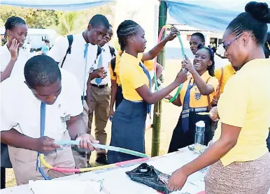  ?? FILE PHOTOS ?? Students from various high schools across Jamaica participat­e in activities at the productivi­ty booth during the college day expo in 2017 at Knox Community College in Mandeville. The activities were geared towards helping students to understand the...