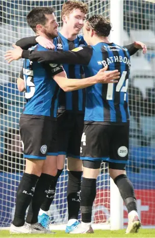  ?? DY Sporting ?? ●● Dale celebrate Conor Grant’s goal in the 2-1 victory against Swindon, the first home win since early October