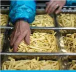  ?? AFP ?? PARIS: Pasta makers are sticking to the simplest versions — such as tagliatell­i here — with demand soaring due to the coronaviru­s outbreak.—