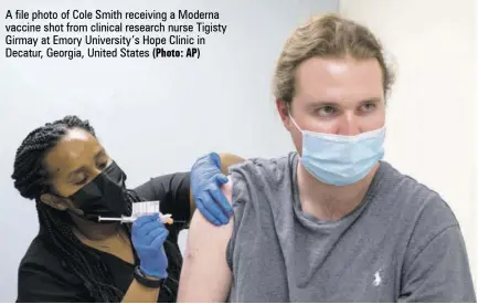  ?? (Photo: AP) ?? A file photo of Cole Smith receiving a Moderna vaccine shot from clinical research nurse Tigisty Girmay at Emory University’s Hope Clinic in Decatur, Georgia, United States