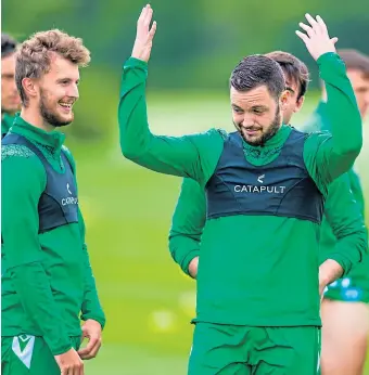 ??  ?? Drey Wright has some fun in training with his new Hibs teammates