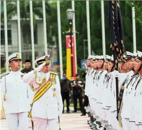  ??  ?? Sultan Sharafuddi­n inspecting the guard of honour during the Warriors’ Day celebratio­n in Shah Alam in October this year.