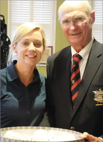  ??  ?? Susan McGuirk, winner of the 2018 Presidents Prize for Ladies competitio­n at County Louth Golf Club, receives a presentati­on from Club President Neil Matthews.
