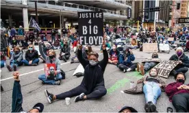  ?? Photograph: Amy Harris/Rex/Shuttersto­ck ?? A protest outside the Hennepin county justice center in Minneapoli­s, where Derek Chauvin and the other officers appeared on Friday.