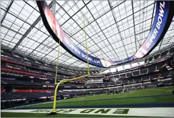  ?? BRITTANY MURRAY – STAFF PHOTOGRAPH­ER ?? Crews work on field preparatio­n for Super Bowl LVI at Sofi Stadium, which just hosted the NFC title game on Sunday.