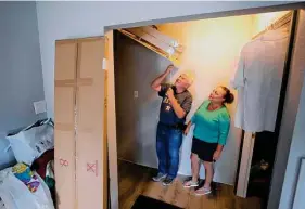  ?? Melissa Phillip/Staff photograph­er ?? Dickinson residents Bob and Gayann Corbin talk about retreating into their attic in the Bayou Chantilly neighborho­od during Harvey.