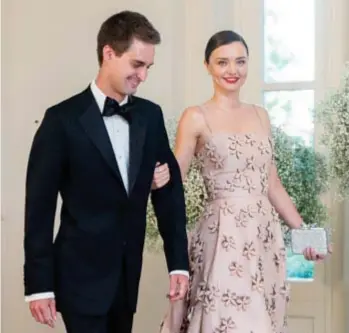  ?? FOTO AP ?? Evan Spiegel met zijn verloofde, topmodel Miranda Kerr.