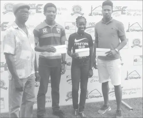  ??  ?? Chairman of the Boyce & Jefford Classic Committee, Colin Boyce (left) with the awardees , Daniel Williams (second left), Chantoba Bright and Compton Caesar, recently at the Mackenzie Sports Club ground, Linden