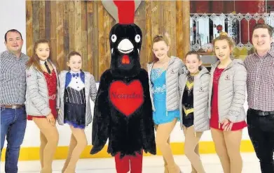  ??  ?? Cock-a-hoop East Kilbride Ice Skating Club are delighted with their new gear from Nandos. The skaters, from left to right, are Holly Freeman, Rebecca Geddes, Cara McCabe, Taylor McLeod and Christie-Anne Shannon