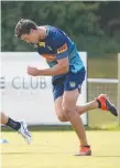  ??  ?? Titans player Sam Stone running during training.