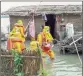  ??  ?? NDRF personnel rescue a baby from a flooded house in Dhubri of Assam on Tuesday —PTI