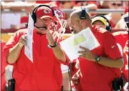  ?? ORLIN WAGNER — THE ASSOCIATED PRESS ?? In this file photo, Kansas City Chiefs head coach Andy Reid, left, and co-offensive coordinato­r Matt Nagy, right, talk during the first half of an NFL preseason football game against the Seattle Seahawks in Kansas City, Mo. Reid turned over some of the...